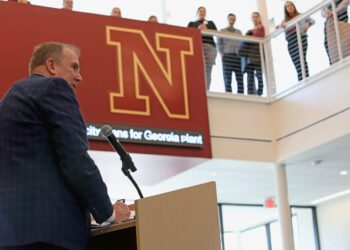 Northern State University President Alan LaFave reflects on the transformation of campus facilities in the past decade during a ribbon cutting Thursday, April 30 for the new Business and Health Innovation Center. Photo courtesy of Northern State University.