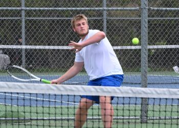 Aberdeen Central's Aric Tennant lines up a forehand during his 7-5, 6-3 win over Aberdeen Roncalli's Liam Voehl Tuesday, May 5 at Holgate Middle School. Aberdeen Insider photo by Robb Garofalo.