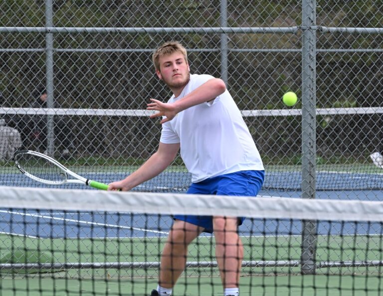 Aberdeen Central's Aric Tennant lines up a forehand during his 7-5, 6-3 win over Aberdeen Roncalli's Liam Voehl Tuesday, May 5 at Holgate Middle School. Aberdeen Insider photo by Robb Garofalo.