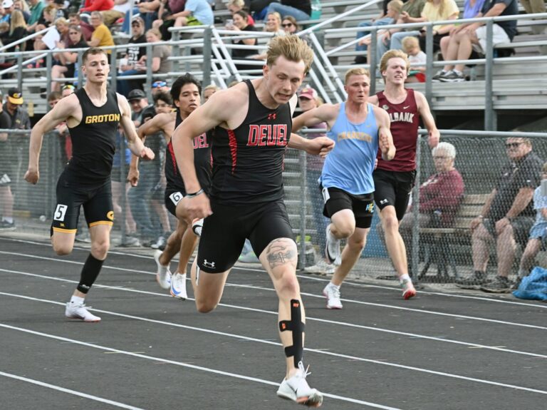 Deuel's Oliver Fieber crosses the line first in the 100-meter dash Thursday, May 14 during the Northeast Conference track meet in Milbank. Fieber set a new meet record, finishing in 10.55 seconds. Aberdeen Insider photo by Robb Garofalo.