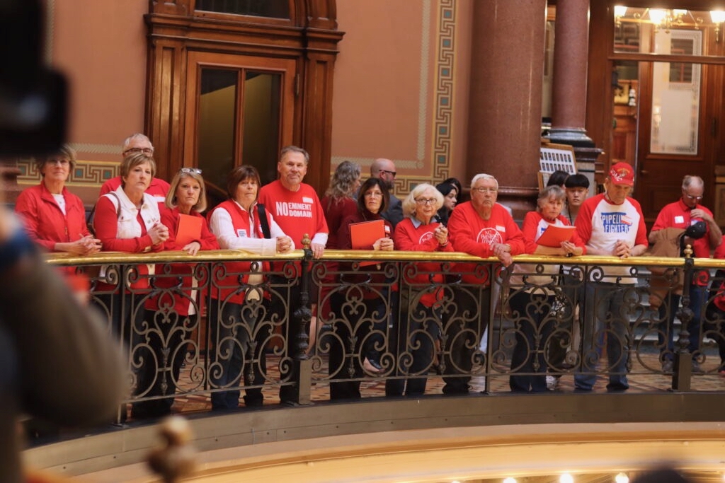 Landowners opposed to carbon sequestration pipelines gathered at the Iowa State Capitol Jan. 13 to lobby in favor of a bill to ban the use of eminent domain for such pipelines. A number of landowners asked the Iowa Utilities Commission on May 20, to deny Summit Carbon Solutions’ request to modify its pipeline route through Iowa. Iowa Capital Dispatch photo by Cami Koons.