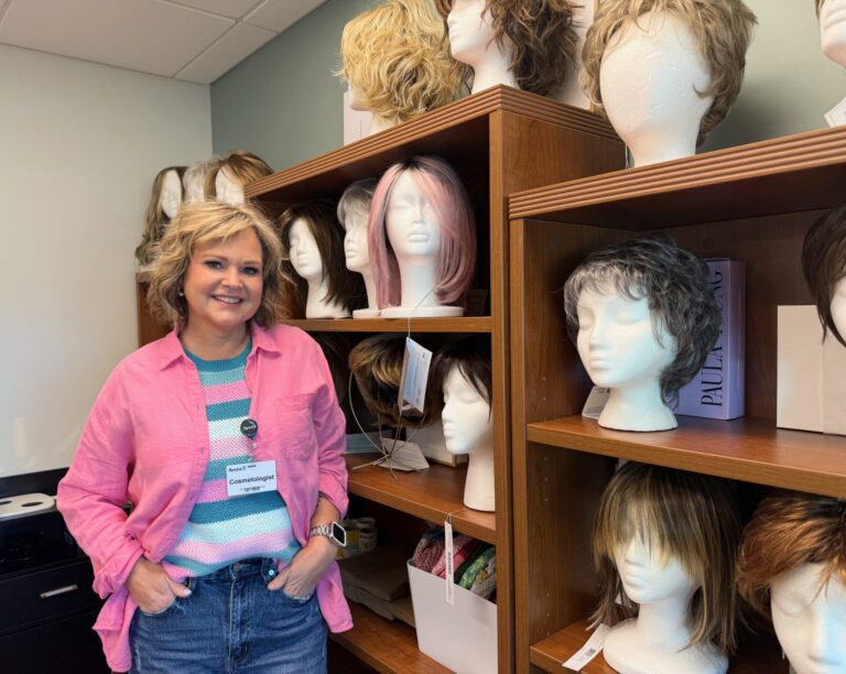 Breast cancer survivor and cosmetologist Angela Glover of Aberdeen spends her Monday mornings consulting patients at a new wig salon at the Avera Cancer Institute. Aberdeen Insider photo by Elisa Sand.
