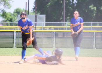 Redfield second baseman, left, Layla Hardie/centerfielder Hayden Gall celebrate after recording an out during the consolation semifinals against Florence/Henry on Friday, June 5 at the Class B state softball tournament at Players Complex in Aberdeen. The Pheasants won 7-6 to advance to the fifth-place game. Freeman Courier photo courtesy of Jeremy Waltner.
