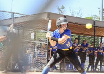 Layla Hardie of Redfield watches a pitch during the Pheasants' fifth-place game against Freeman-Freeman Academy on Saturday, June 6 during the Class B high school softball tournament at Players Complex in Aberdeen. The Phoenix won 5-3. Aberdeen Insider photo by Allie Hoekman.