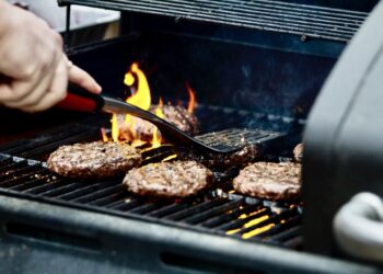 Hamburgers on a grill for a cookout. Phot courtesy of Zac Cain.