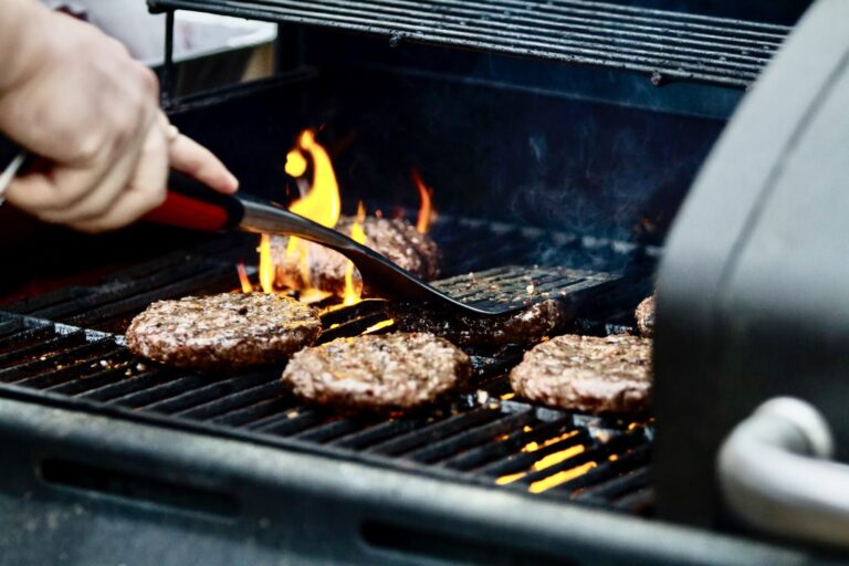 Hamburgers on a grill for a cookout. Phot courtesy of Zac Cain.