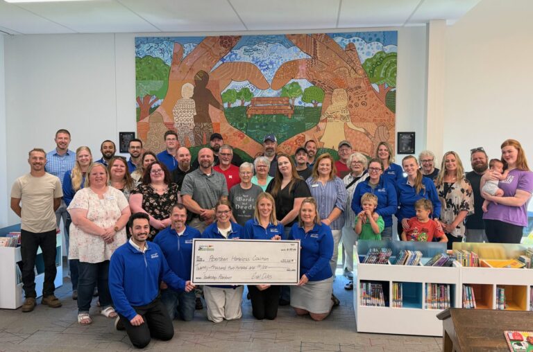 The Aberdeen Homeless Coalition received a $20,200 donation from the 2026 Leadership Aberdeen Class as part of its community project, which involved fundraising for the coalition and creating a mural now hanging at the K.O. Lee Aberdeen Public Library. Aberdeen Insider photo by Elisa Sand.