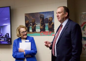 Mary Cundy, director of the Center for Statewide E-Learning, and Northern State University President Alan LaFave visit about the center on the NSU campus during a tour with members of the Aberdeen Area Chamber of Commerce. Aberdeen Insider photo by Elisa Sand.