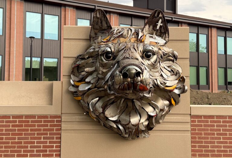A new wolf head sculpture, created by John Lopez of Lemmon, is now on display on the west side of Northern's new Business and Health Innovation Center. Aberdeen Insider photo by Elisa Sand.
