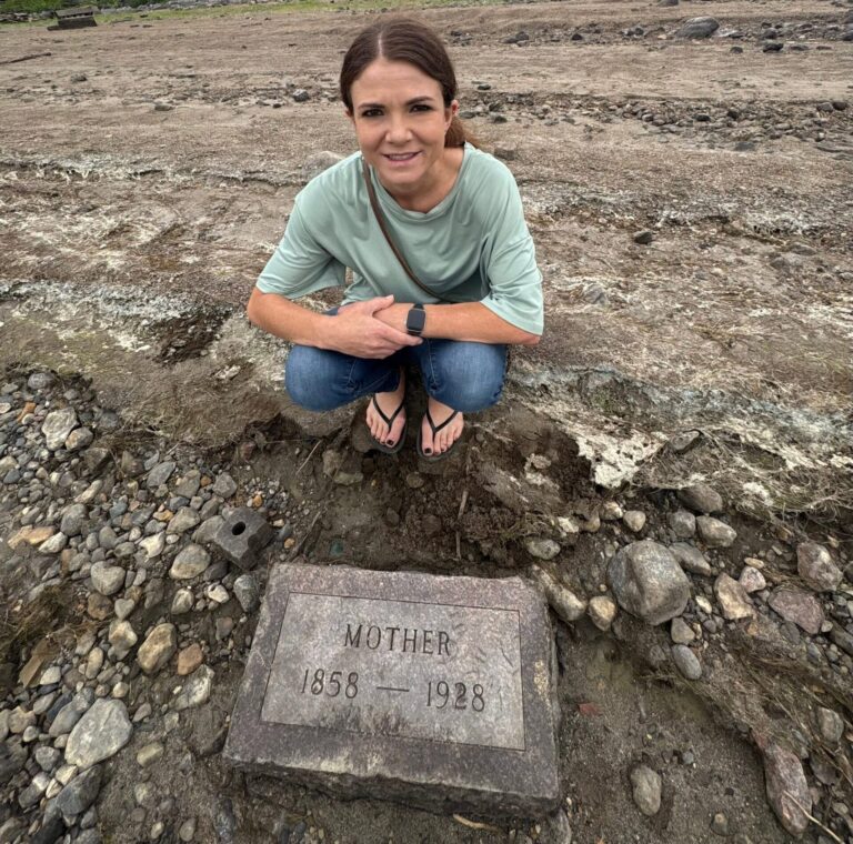 Tasha Tietz with one of the tombstones recently found at Richmond Lake. Tietz is known as Graveyard Girl on social media and studies graveyards and cemeteries. Courtesy photo.