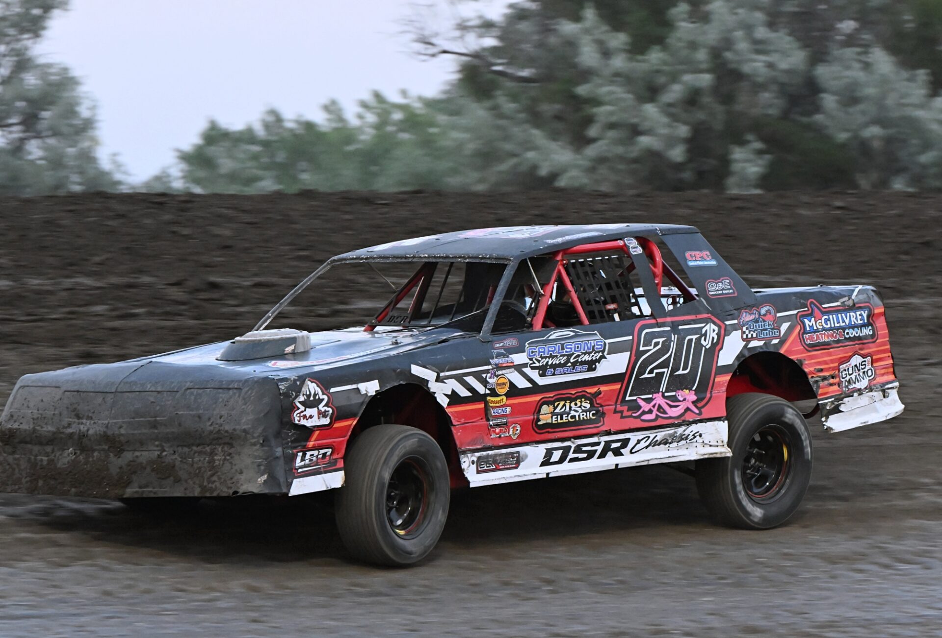 Huron's Jayden Bogh stays towards the middle of the track heading into the second turn during the Street Stock feature Friday, July 3 at Brown County Speedway. He won the race. Aberdeen Insider photo by Robb Garofalo.