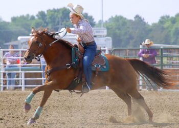 Lilly Mundt of Britton rides in the girls barrel racing competition Saturday, July 4 during the Brown County 4-H Rodeo at Ackerman Arena. Aberdeen Insider photo by Jason Lopez Martinez.