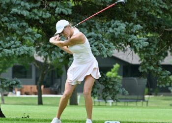 Aberdeen's Olivia Braun leans into her tee shot on the 10th hole during round of the Sanford Series Northeast Invitational Monday, July 6 at Moccasin Creek Country Club. Braun carded a two-day total 141 to win the event. Aberdeen Insider photo by Robb Garofalo.