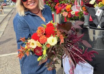 Selling flowers at the Malchow Farmers Market gives Gigi Browning a chance to meet new people as she shares her bouquets. She operates Dorothy's Gardens near Mina. Courtesy photo.