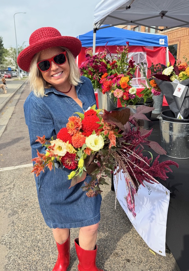 Selling flowers at the Malchow Farmers Market gives Gigi Browning a chance to meet new people as she shares her bouquets. She operates Dorothy's Gardens near Mina. Courtesy photo.