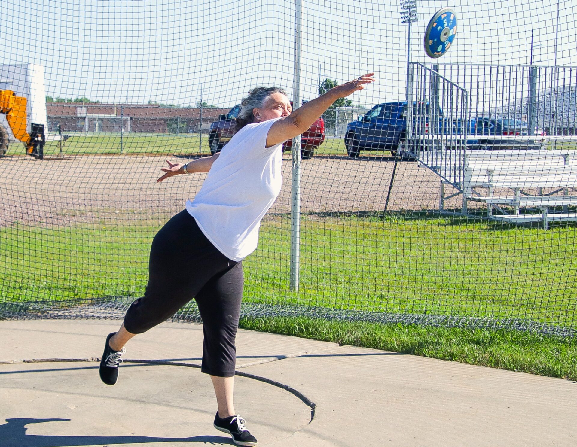 Nicole Martin of Aberdeen throws the discus during the track and field competition at the Aberdeen Area Senior Games Sunday, July 12 at the Brownell Activities Complex. Aberdeen Insider photo by Jason Lopez Martinez.