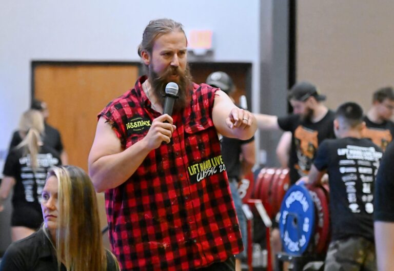 Aberdeen's Tanner Baird of Massenomics Gym addresses the crowd during the 2025 Lift Hard, Live Easy powerlifting competition at the Best Western Ramkota Hotel. This year's event is Friday, July 17 and Saturday, July 18 at the Ramkota. Aberdeen Insider photo by Robb Garofalo.