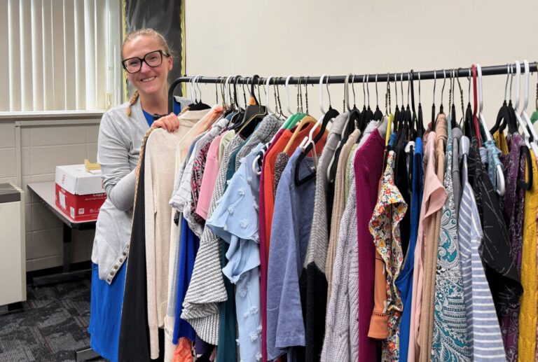 Carly Bierman, career services coordinator at Northern State University, stands in the new space designated for Wolves Wardrobe, a clothing service for students who need professional attire. Aberdeen Insider photo by Elisa Sand.