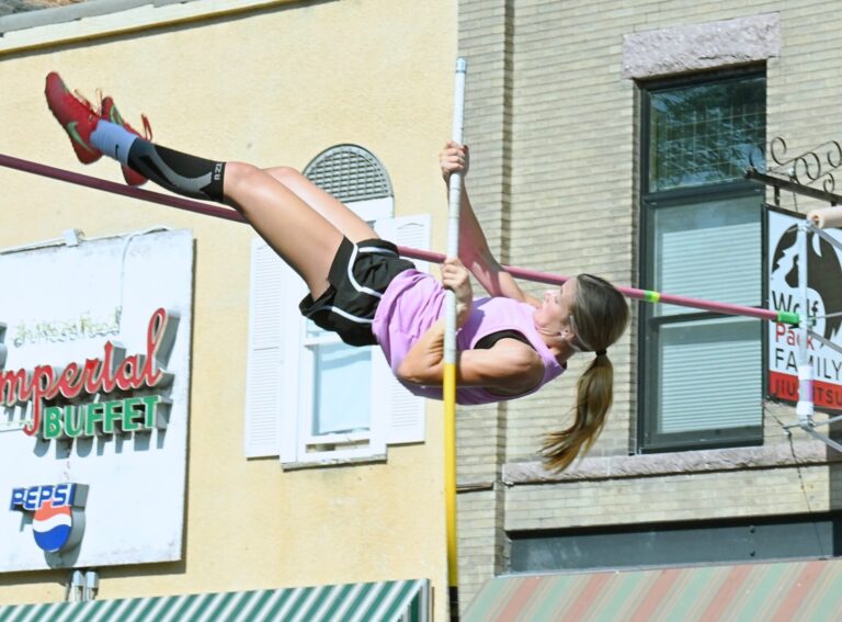 Eureka's Peyton Schnabel attempts to clear the bar during the Hub City Street Vault Thursday, July 16 on Main Street in downtown Aberdeen. Aberdeen Insider photo by Robb Garofalo.