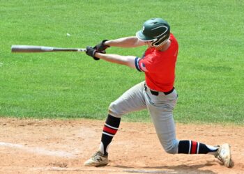 Aberdeen Circus outfielder WolfDon Thorson levels his swing after driving the ball to the wall in left field for a triple in the second inning Saturday, July 25 against Renner at Fossum Field. Thorson scored one batter later, but the Circus lost 16-10. Aberdeen Insider photo by Robb Garofalo.