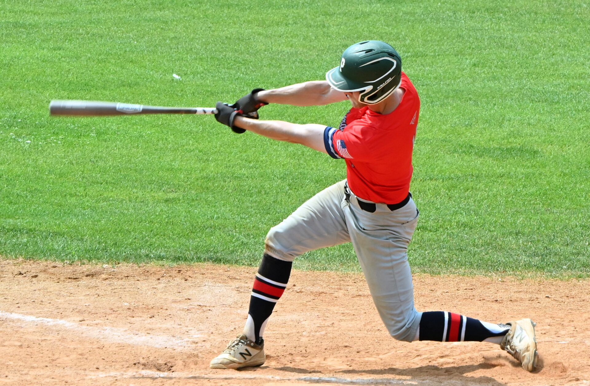 Aberdeen Circus outfielder WolfDon Thorson levels his swing after driving the ball to the wall in left field for a triple in the second inning Saturday, July 25 against Renner at Fossum Field. Thorson scored one batter later, but the Circus lost 16-10. Aberdeen Insider photo by Robb Garofalo.