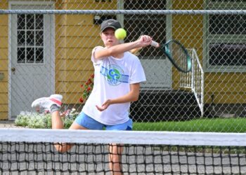 Aberdeen's Penelope Vogel rips a forehand during her singles match in the Hub City Open tennis tournament on Sunday, July 26 at the Northern State courts. Aberdeen Insider photo by Robb Garofalo.