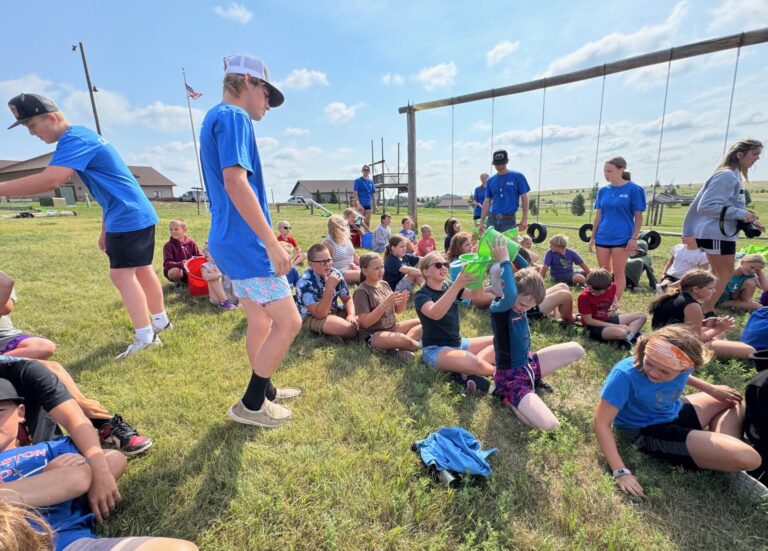 Campers at South Dakota Farmers Union Junior Leadership Camp in Huron complete a bucket relay. The camp was June 19-22 in Huron. Photo courtesy of South Dakota Farmers Union.