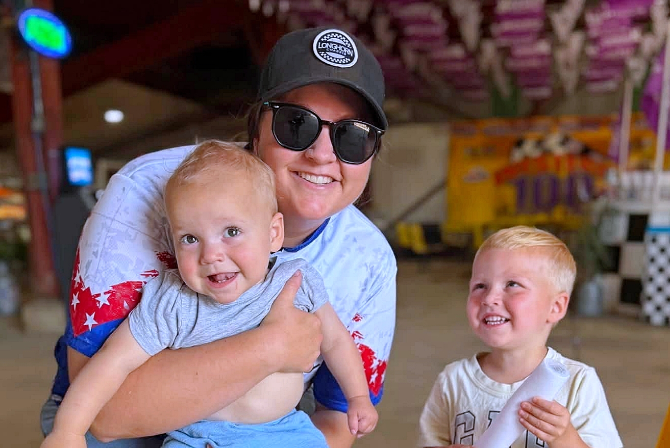 Aberdeen's Shelby Arment hangs out with young racing fans during Kids Night Friday, July 31 at Brown County Speedway. Courtesy photo.