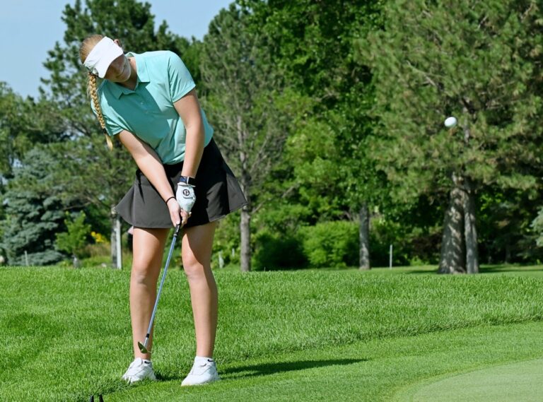 Mitchell's Allison Meyerink chips onto the green on the par-five sixth hole during the South Dakota Golf Association Women's Match Play Championship Friday, July 31 at Moccasin Creek Country Club. She won the title in a playoff on Sunday, Aug. 2. Aberdeen Insider photo by Robb Garofalo.