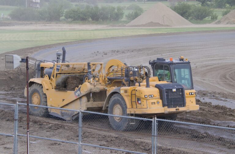 Brown County Highway Department workers were busy at the fairgrounds Monday, Aug. 3 leveling the Brown County Speedway racetrack to prepare for the Dacotah Bank Stampede rodeo, which opens the Brown County Fair Monday, Aug. 10 and Tuesday, Aug. 11 at the Larry Gerlach Grandstand. Aberdeen Insider photo by Elisa Sand.