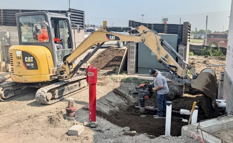 A crew works to cover utilities as a project to add a 1,650-square-foot expansion to the Aberdeen Regional Airport terminal continued Thursday, Aug. 6. The job will allow baggage-screening equipment now in the lobby to be moved to a secure area. Aberdeen Insider photo by Scott Waltman.