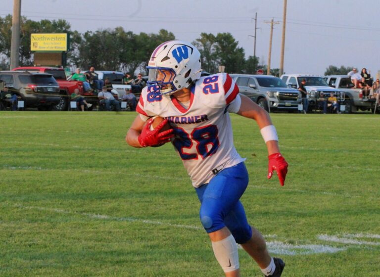 Warner's Brennan Wolf-Donat heads upfield after catching a pass in the first quarter against Northwestern Friday, Aug. 21 in Mellette. Warner won the game 48-8. Aberdeen Insider photo by Allie Hoekman.