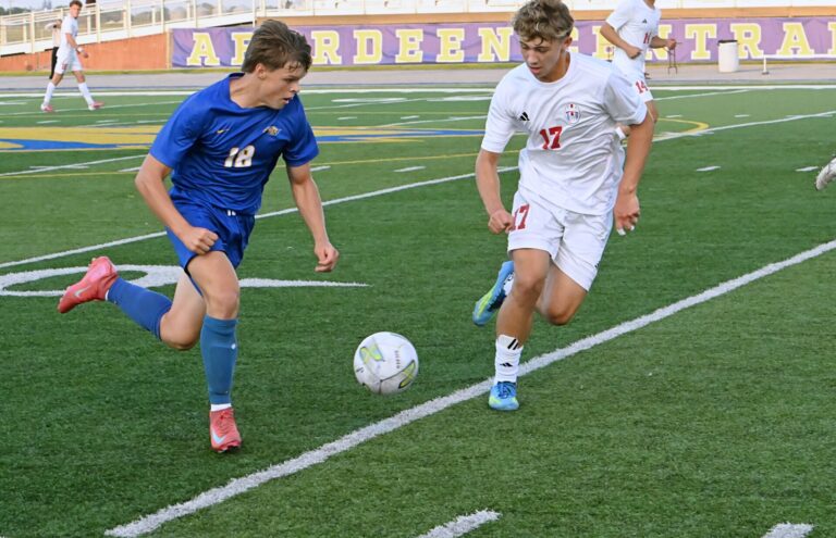 Aberdeen Central's Brook Bonn, left, and Sioux Falls Lincoln's Berhart Rheins pursue the ball during the first half of Central's 1-0 win Friday, Aug. 21 at Brownell Activities Complex. Aberdeen Insider photo by Robb Garofalo.