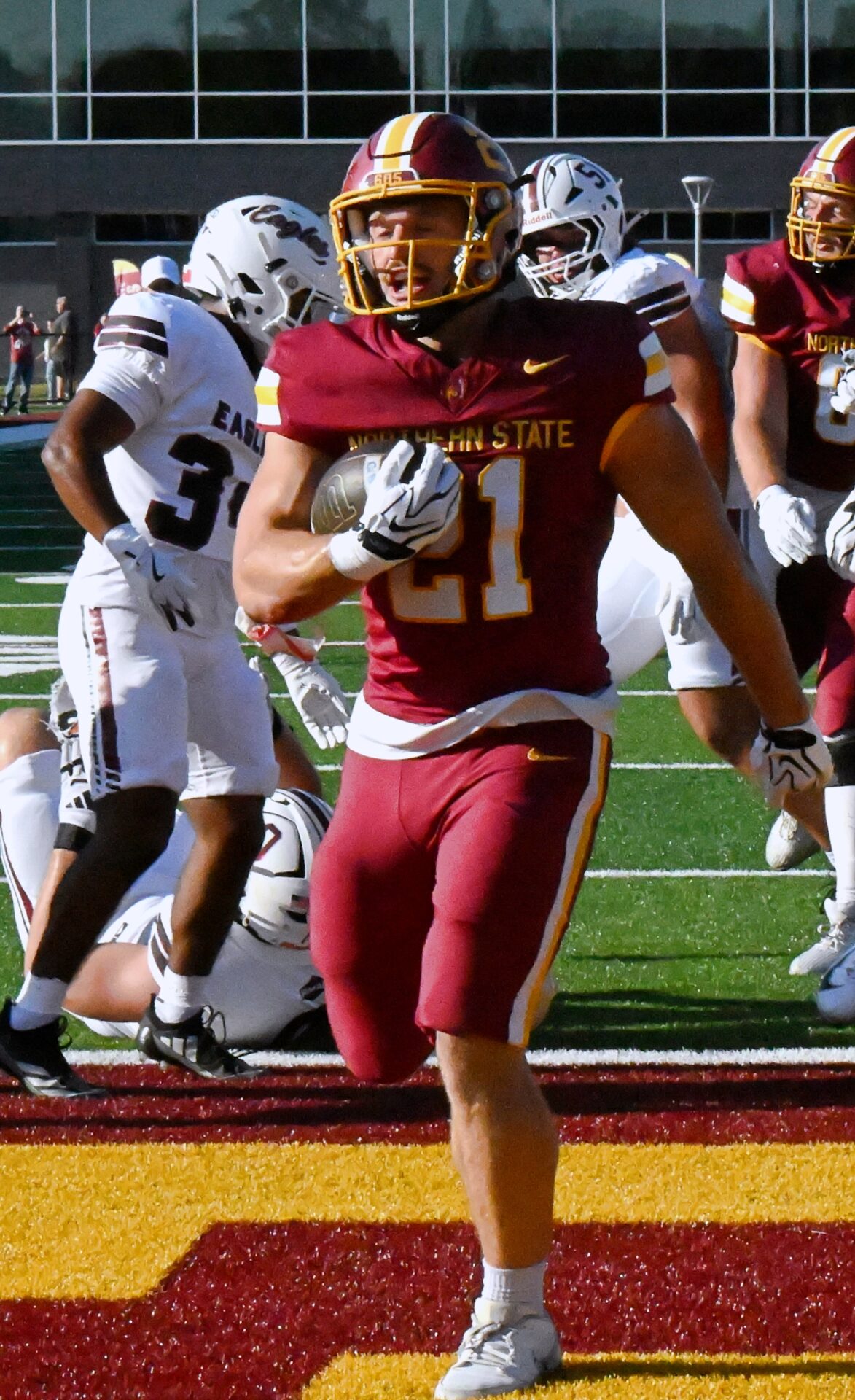 Northern State's Hank Kraft finds the end zone in the first quarter of the Wolves 42-17 win over Chadron State Thursday, Aug. 27 at Dacotah Bank Stadium. Kraft rushed for 232 yards and four touchdowns. Aberdeen Insider photo by Robb Garofalo.