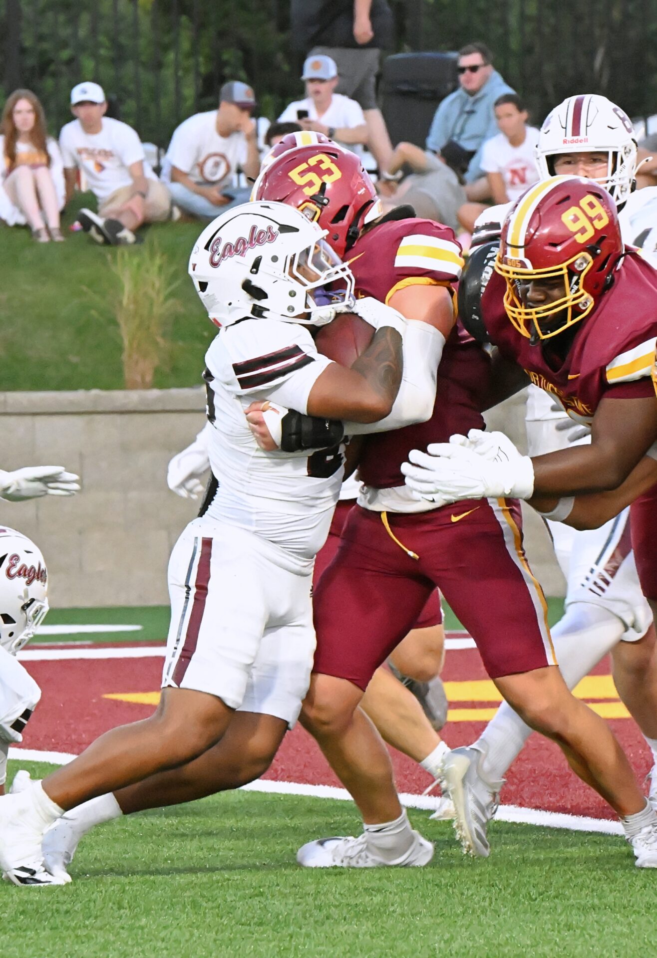 Northern State's Graham Borden stands up Chadron State's Devon Rivers during the fourth quarter of the Wolves 42-17 win Thursday, Aug. 27 at Dacotah Bank Stadium. Joining Borden on the tackle is Kistyn Odom.