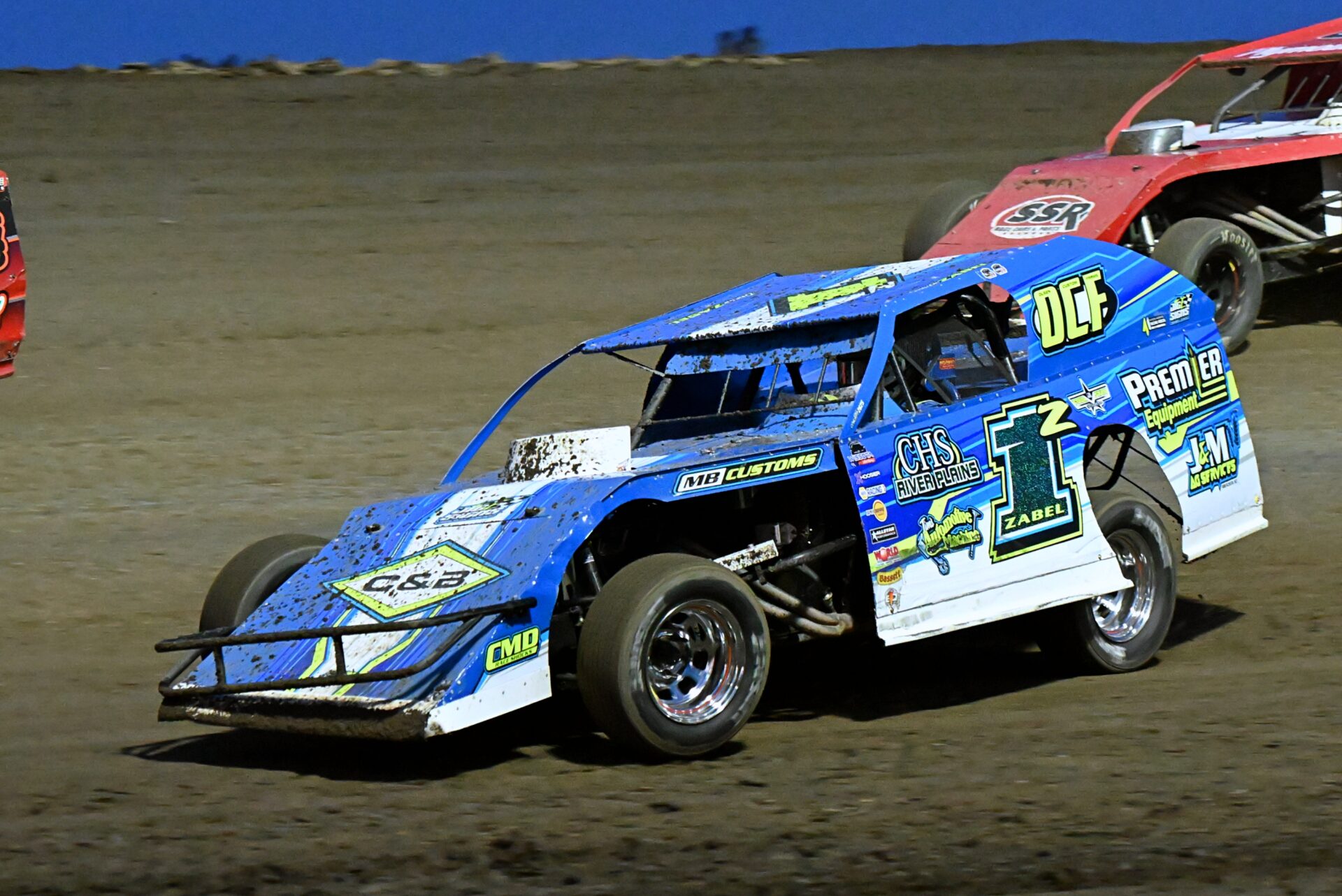 Sports roundup: Former Presentation College soccer coach returns to knock off Northern 4 Selby's Dawson Zabel stays to the lower part of the track heading into the fourth turn at the Brown County Speedway during a race earlier this summer. Zabel won the Midwest Modified feature Friday, Aug. 28 to clinch the 2026 the division's season points championship. Aberdeen Insider photo by Robb Garofalo.