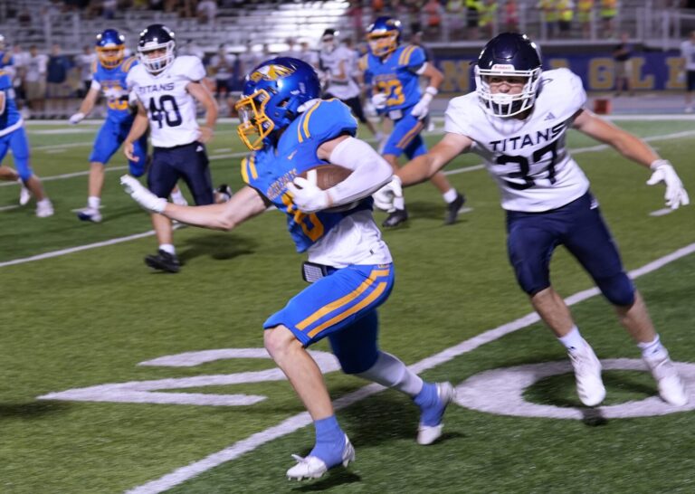 Aberdeen Central's Carter Lust heads upfield on a punt return against tea Area Friday, Sept. 4 at the Brownell Activities Complex. The Eagles lost 45-7. Defending for Tea is Landon Siemonsma. Photo by Kevin Foss for the Aberdeen Insider.