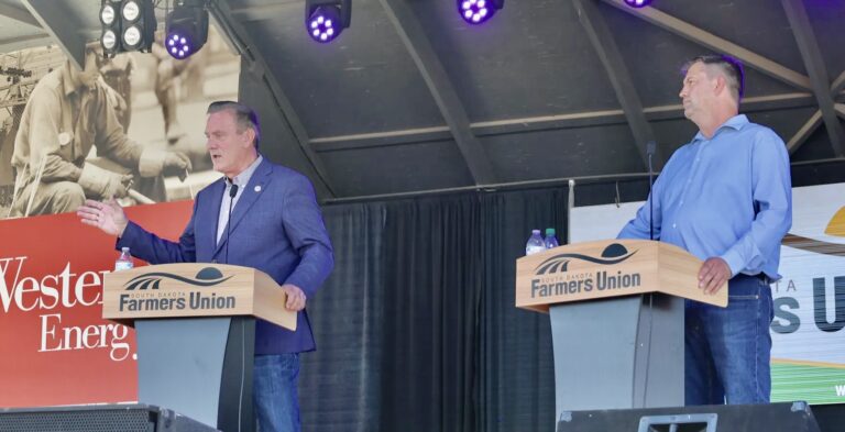 Gov. Larry Rhoden, left, debated Democratic challenger Dan Ahlers Saturday, Sept. 5 at the South Dakota State Fair in Huron. Dakota Scout photo by Jonathan Ellis.