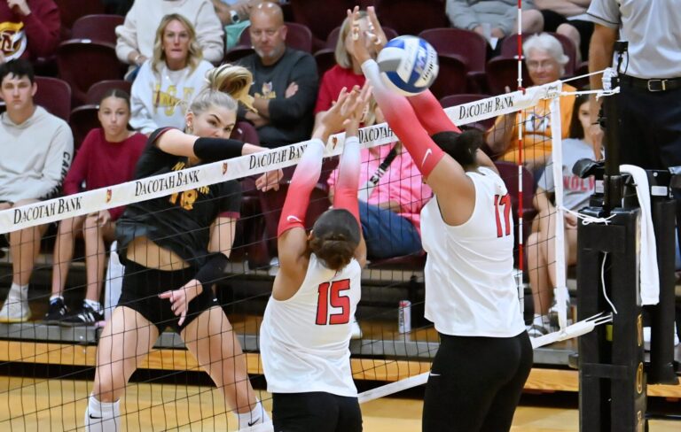 Sports roundup: Northern State volleyball squad sweeps Minnesota Crookston, Minnesota State Moorhead 3 Northern State's Linnea Neisham rips a kill through the block attempt of Minnesota State Moorhead's Mya Pfeifer (15) and Raiah Mandell during the second set of the Wolves sweep on Saturday, Sept. 12 at Wachs Arena. Aberdeen Insider photo by Robb Garofalo.