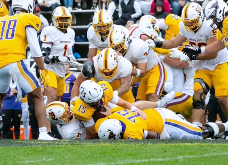 Minnesota State Mankato cools Wolves hot start, Northern hosts UMary for homecoming 10 Northern State's Kale Johnson, bottom left, along with teammates Gabe Gutierrez (32) and Andrew Ewald combine to take down Minnesota State Mankato quarterback Mitchell Thompson (15) on Saturday, Sept. 19 at Blakeslee Stadium in Mankato, Minn. Courtesy photo.