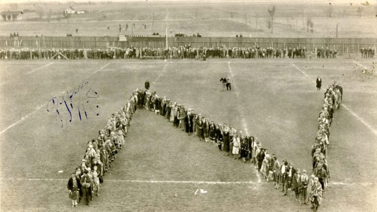 Northern Normal and Industrial School students and alums stand in the form of an N on the football field. Photo courtesy of Beulah Williams Library Archives and Special Collections.