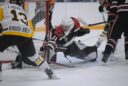 Aberdeen Wings goaltender Willum Braun slides across the crease for a save against Austin forward Brett Ludvigsen Saturday, Oct. 3 at the Odde Ice Center. Braun had 27 saves. Photo by Megan Rosendahl for the Aberdeen Insider.