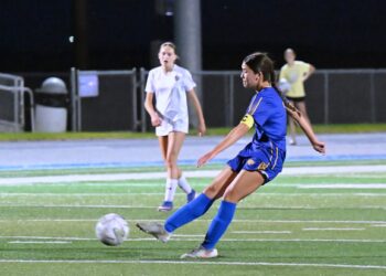 Aberdeen Central's Keyana Stillman leans into a shot on goal during the second half of Central's Class AA girls soccer playoff game against Tea Area Tuesday, Oct. 6 at the Brownell Activities Complex. Stillman scored on the shot as the Eagles advanced with a 3-0 victory. Aberdeen Insider photo by Robb Garofalo.