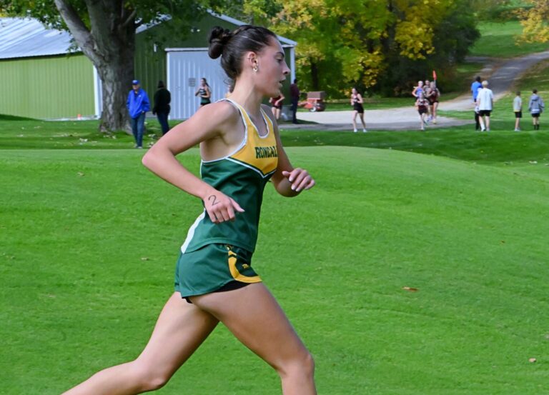 Aberdeen Roncalli's Addison Cassady won the Northeast Conference Cross-Country Meet girls race Thursday, Oct. 8 in Webster. The Cavaliers took the team title. Aberdeen Insider photo by Robb Garofalo.