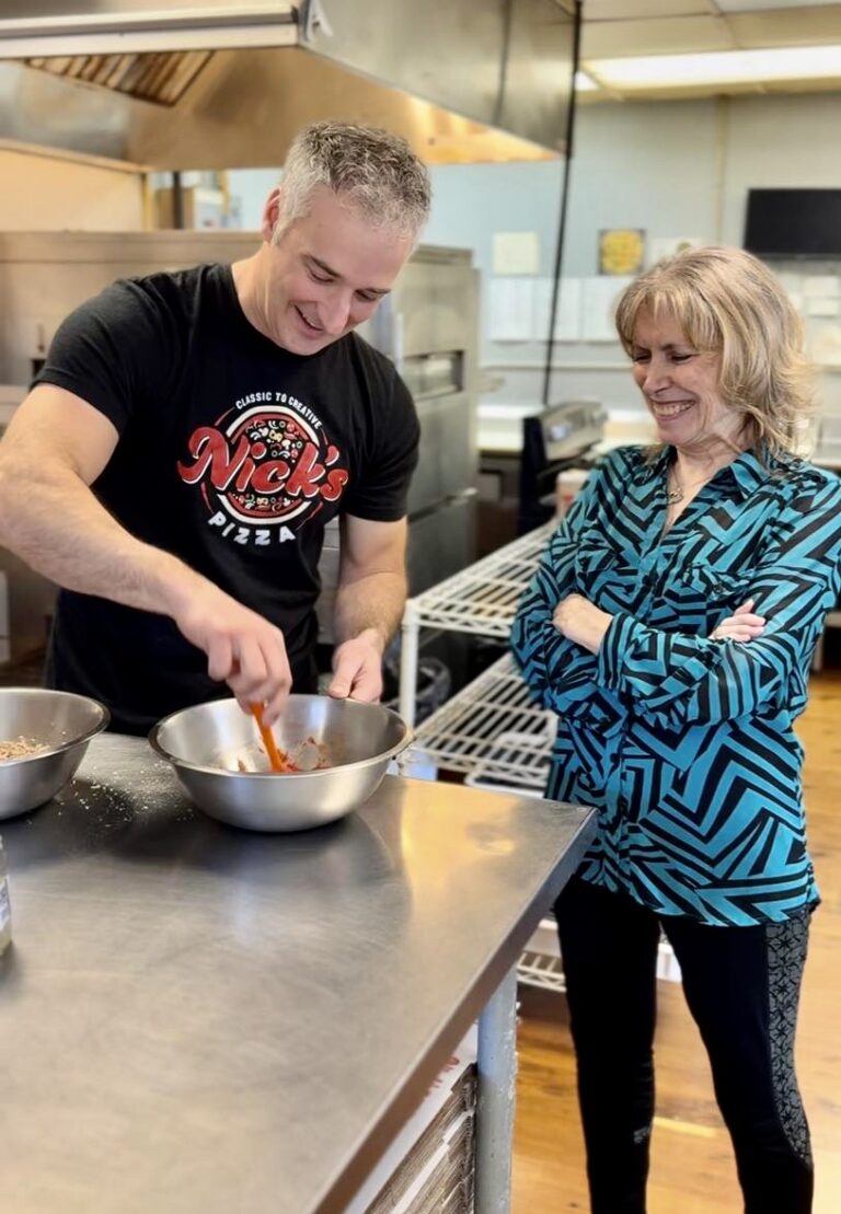 Nick Schaunaman, left, owner of Nick's Pizza, works with Loretta McLaughlin to recreate the flavor of a Lu's pie. Nick's will be selling two pizzas formerly offered by Lu's during a two-week collaboration. Courtesy photo.